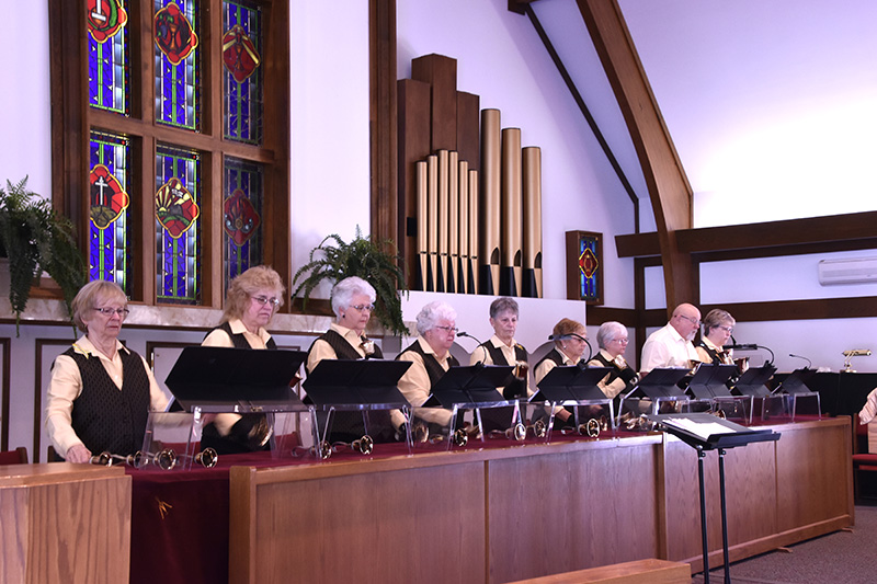 Nine members of the Bell Choir